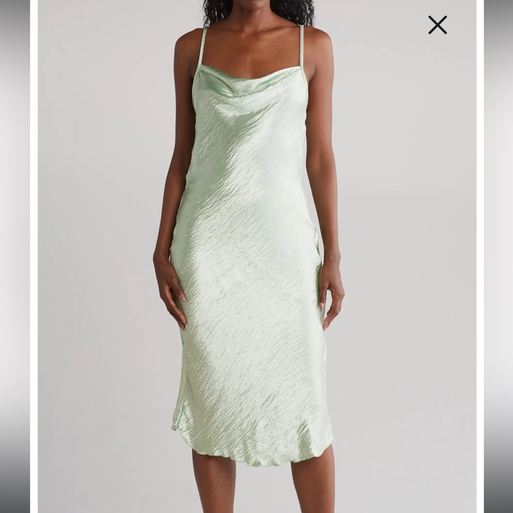 Bebe new dress with tags. Never worn, very comfortable